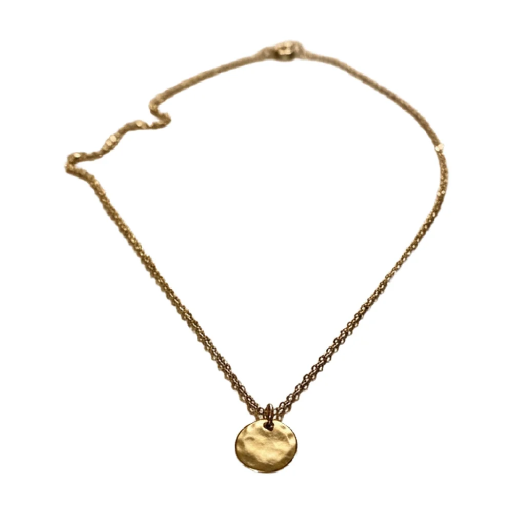 Gold pendant necklace on a pure white background